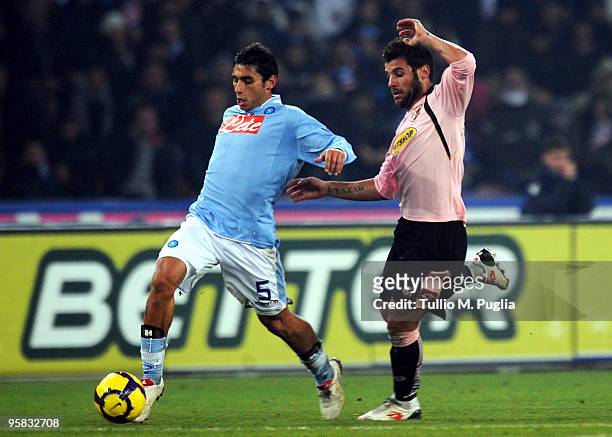 Michele Pazienza of Napoli and Antonio Nocerino of Palermo compete for the ball during the Serie A match between SSC Napoli and US Citta di Palermo...