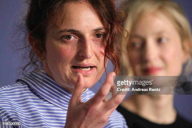 Director Alice Rohrwacher speaks as actress Alba Rohrwacher looks on at the press conference for "Happy As Lazzaro " during the 71st annual Cannes...