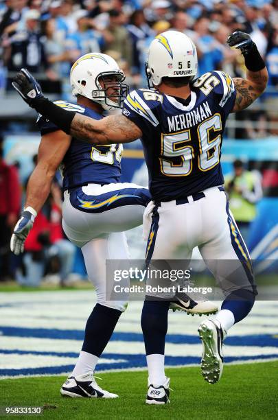 Linebackers Shawne Merriman and Stephen Cooper of the San Diego Chargers celebrate a defensive play against the New York Jets during the AFC...