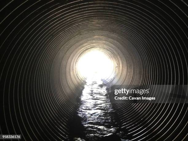 interior of sewage tunnel - inside manhole stock pictures, royalty-free photos & images