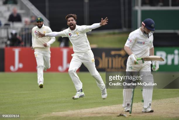Mohammad Amir of Pakistan clean bowls Niall O'Brien of Ireland during the fourth day of the international test cricket match between Ireland and...