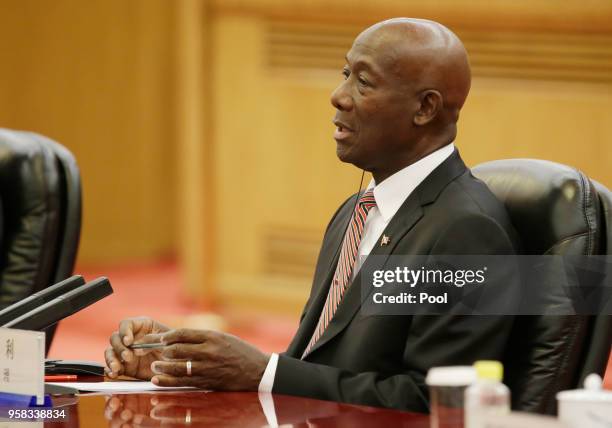 Trinidad and Tobago Prime Minister Keith Rowley speaks during a meeting with China's Premier Li Keqiang at the Great Hall of the People on May 14,...