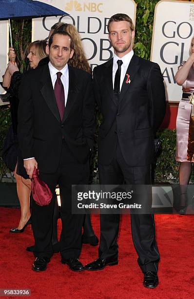 Actors Peter Jacobson and Jesse Spencer arrive at the 67th Annual Golden Globe Awards at The Beverly Hilton Hotel on January 17, 2010 in Beverly...