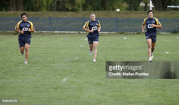 George Smith, Matt Giteau and Adam Ashley-Cooper during a Brumbies Super-14 training session at Griffith Oval on January 18, 2010 in Canberra,...