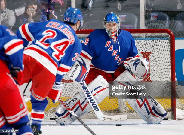 Chad Johnson and Ryan Callahan of the New York Rangers practice prior to the game against the Montreal Canadiens on January 17, 2010 at Madison...