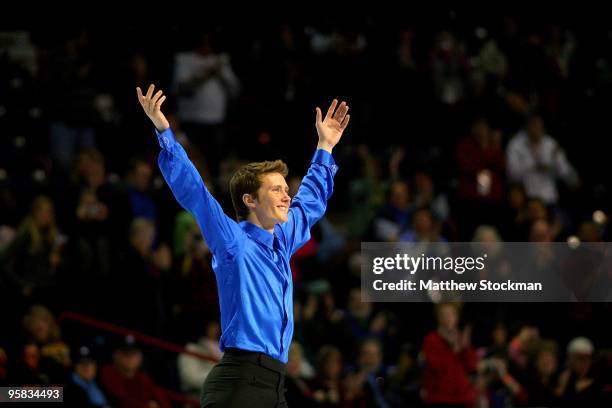 Jeremy Abbott acknowledges the crowd as he takes the ice before the medal ceremony for the men's event during the US Figure Skating Championships at...