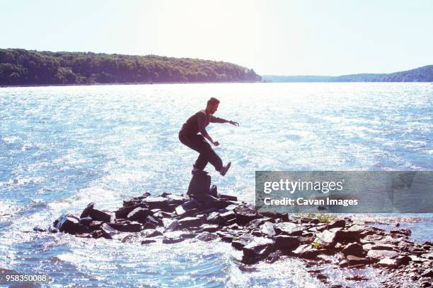 Man Balancing Rocks 881 Balancing Rock Stock Photos, High-Res Pictures, and Images - Getty ...