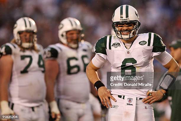 Quarterback Mark Sanchez of the New York Jets smiles on the field in the final moments of the AFC Divisional Playoff Game against the San Diego...