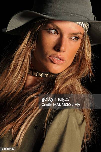Brazilian top model Alessandra Ambrosio presents a creation by Colcci during the opening day of the 2010-2011 Fall-Winter collections of the Sao...