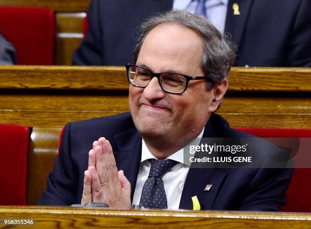 Junts per Catalonia MP and presidential candidate Quim Torra gestures during a vote session to elect a new regional president at the Catalan...