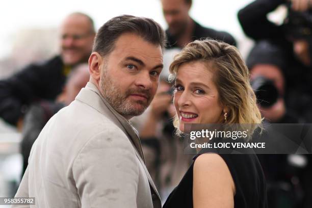 French actor Clovis Cornillac and French actress Karin Viard pose on May 14, 2018 during a photocall for the film "Little Tickles " at the 71st...