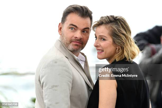 Actor Clovis Cornillac and Karin Viard attend the photocall for "Little Tickles " during the 71st annual Cannes Film Festival at Palais des Festivals...