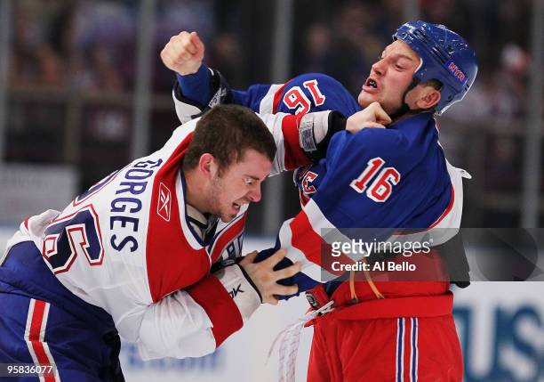 Sean Avery of the New York Rangers fights Josh Gorges of the Montreal Canadiens during their game on January 17, 2010 at Madison Square Garden in New...