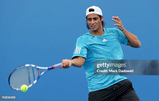 Nicolas Lapentti of Ecuador plays a forehand plays a forehand in his first round match against Viktor Troicki of Serbia during day one of the 2010...