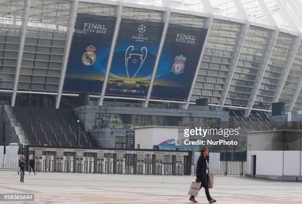 Banner with the logo for the 2018 UEFA Champions League Final is seen on the NSC Olimpiyskiy football stadium, where will hold the final match of the...
