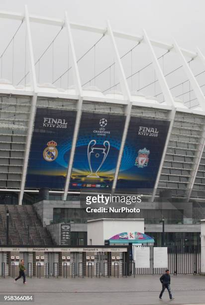 Banner with the logo for the 2018 UEFA Champions League Final is seen on the NSC Olimpiyskiy football stadium, where will hold the final match of the...