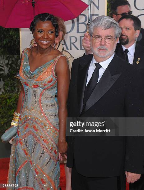 Director George Lucas and Mellody Hobson arrive at the 67th Annual Golden Globe Awards held at The Beverly Hilton Hotel on January 17, 2010 in...
