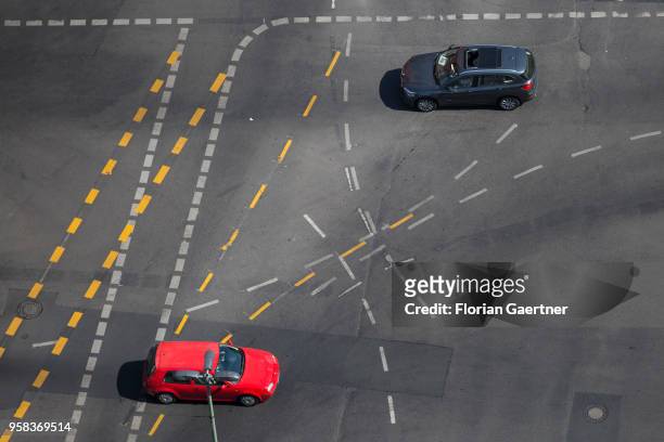 Two cars are pictured on a crossroads with on May 09, 2018 in Berlin, Germany.