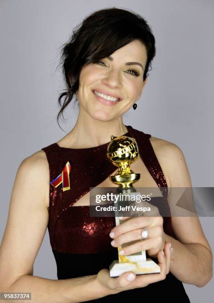 Actress Julianna Margulies poses for a portrait backstage during the 67th Annual Golden Globe Awards at The Beverly Hilton Hotel on January 17, 2010...