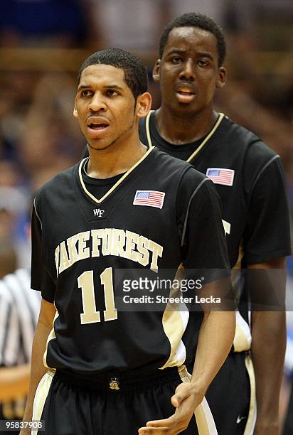 Teammates C.J. Harris and Al-Farouq Aminu of the Wake Forest Demon Deacons react against the Duke Blue Devils during their game on January 17, 2010...