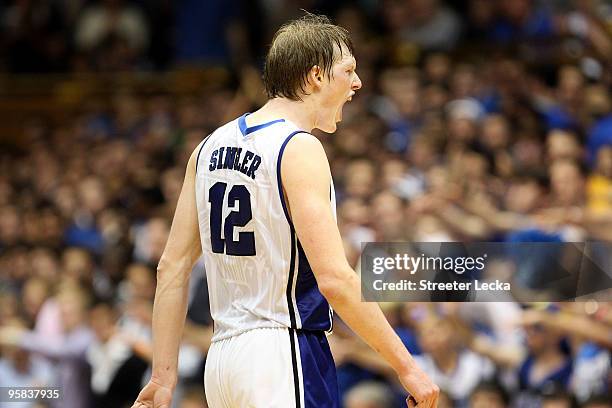 Kyle Singler of the Duke Blue Devils reacts after making a basket during their game against the Wake Forest Demon Deacons at Cameron Indoor Stadium...