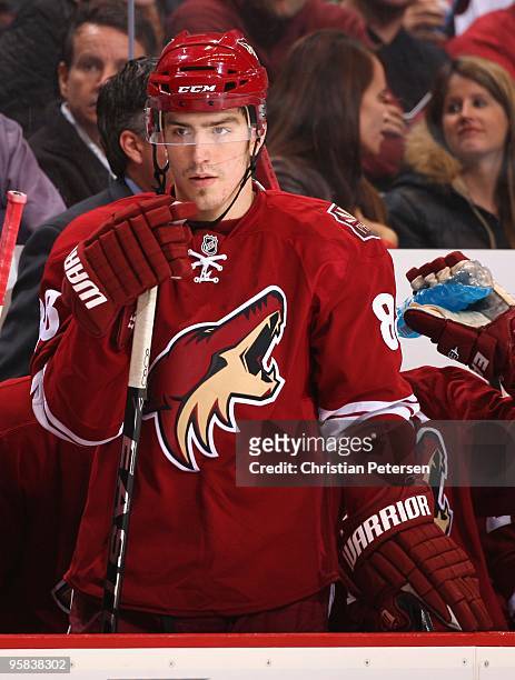 Peter Mueller of the Phoenix Coyotes watches from the bench during the NHL game against the New Jersey Devils at Jobing.com Arena on January 14, 2010...