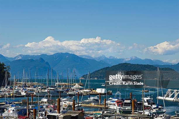 ferry boat approaching harbor - vancouver horseshoe bay stock pictures, royalty-free photos & images
