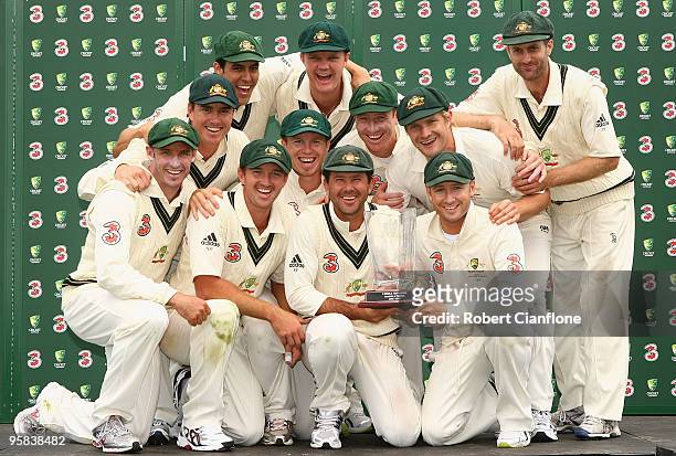 The Australian team pose after defeating Pakistan on day five of the Third Test match between Australia and Pakistan at Bellerive Oval on January 18,...