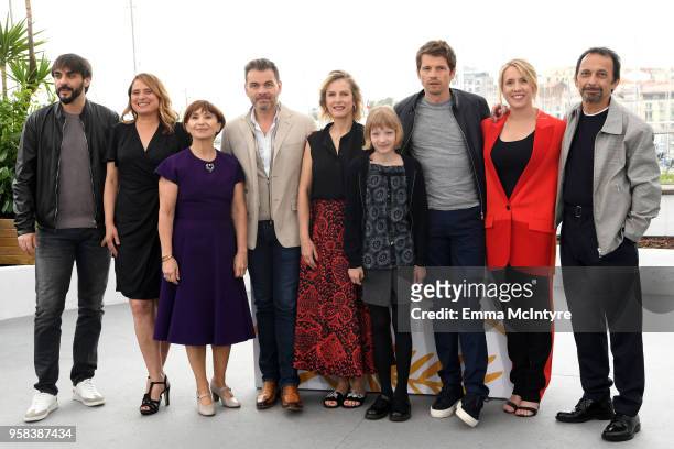 Ariane Ascaride, Clovis Cornillac, Karin Viard, Cyrille Mairesse, Pierre Deladonchamps, Andrea Bescond and two guests attend the photocall for...