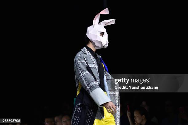 Model showcases designs on the runway at the Zhejiang University of Science and Technology School of Apparel Design Show during the day 1 of 2018...