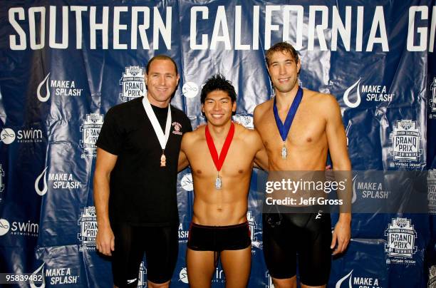 Jason Lezak, Masayuki Kishida and Matt Grevers pose after swimming in the Men's 50 Free Final during the Long Beach Grand Prix on January 17, 2010 in...