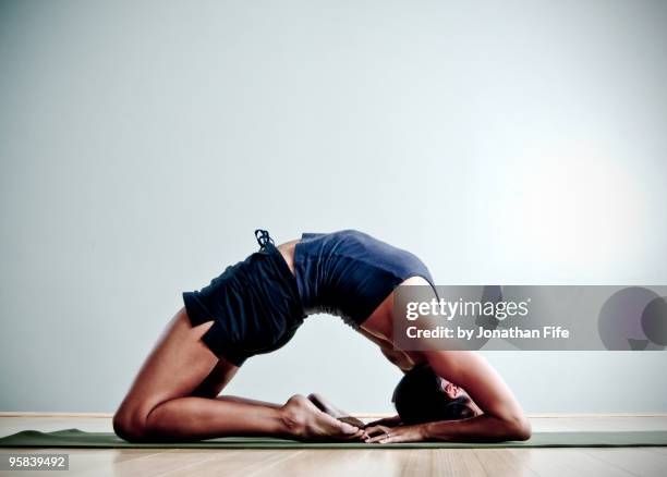 backbend - leaning back stock pictures, royalty-free photos & images