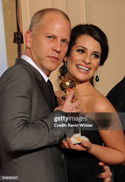Producer/writer Ryan Murphy and actress Lea Michele pose in the press room with the award for Best Television Series - Comedy Or Musical for "Glee"...