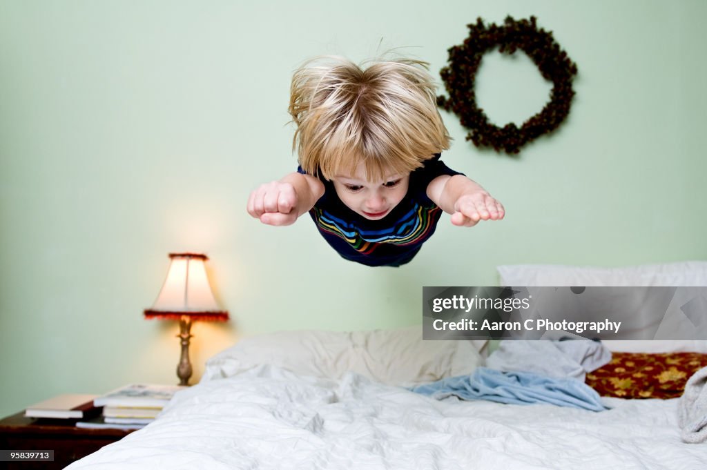 Boy Levitates on Bed