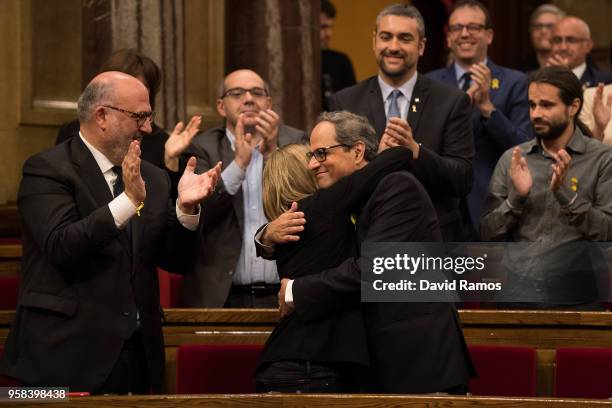 Quim Torra is congratuled by Elsa Artadi, spokesperson of the pro-independence party Junts Per Catalunya after being elected as the new President of...