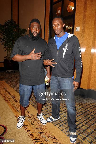The "World strongest Street fighter" Da-Da 5000 and Gold Medalist "world fastest Man Alive" Usain Bolt during a meet and greet of the world three top...