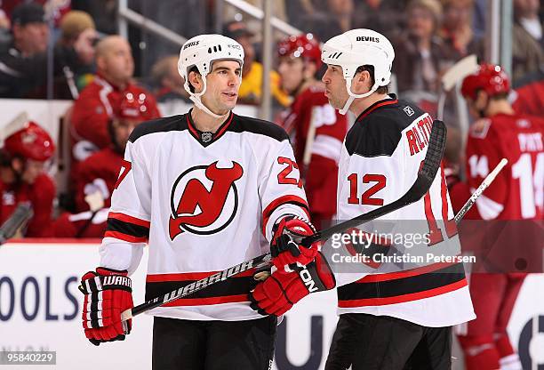 Brian Rolston and Mike Mottau of the New Jersey Devils talk during the NHL game against the Phoenix Coyotes at Jobing.com Arena on January 14, 2010...