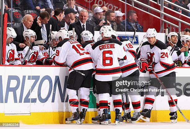 Head coach Jacques Lemaire of the New Jersey Devils speaks to his team during a time out late in the third period of the NHL game against the Phoenix...