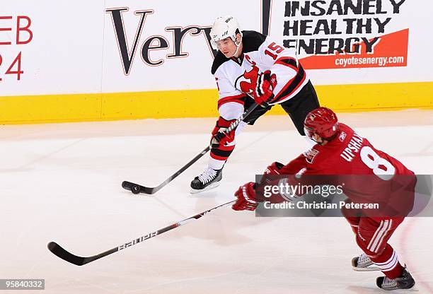 Matthew Lombardi of the New Jersey Devils looks to pass the puck during the NHL game against the Phoenix Coyotes at Jobing.com Arena on January 14,...