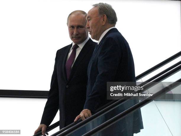 Russian President Vladimir Putin and Kazakh President Nursultan Nazarbayev arrive to the Eurasian Economic Union Summit May 14, 2018 in Sochi,...