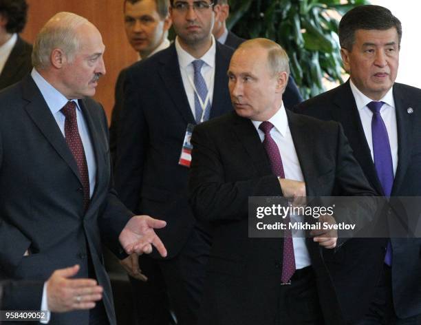 Belarussian President Alexander Lukashenko, Russian President Vladimir Putin,, Kyrgyz President Sooronbay Jeenbekov are seen at the Eurasian Economic...