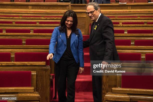 Quim Torra shake hands with Marcela Topor, wife of Carles Puigdemont former President of Catalonia, after being elected the new President of...