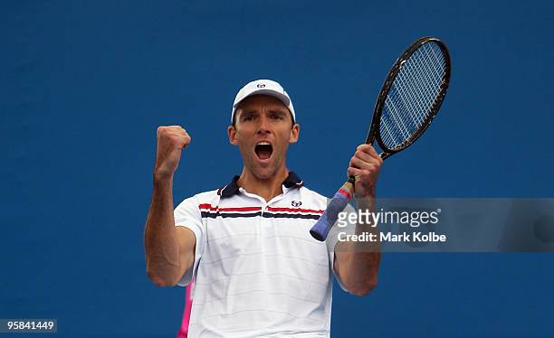 Ivo Karlovic of Croatia celebrates winning match point after his first round match against Radek Stepanek of the Czech Republic during day one of the...