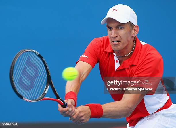 Jarkko Nieminen of Finland plays a backhand in his first round match against Nick Lindahl of Australia during day one of the 2010 Australian Open at...