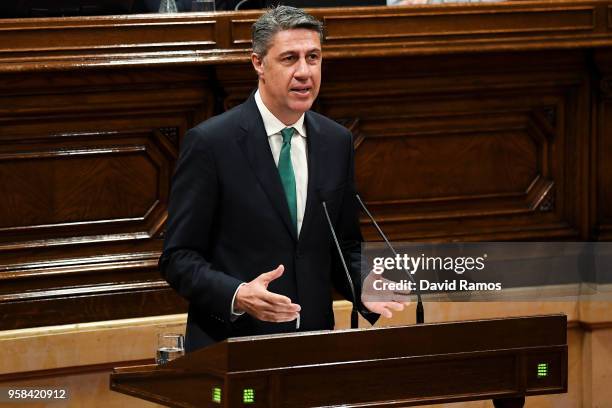 Xavier Garcia Albiol, leader of Partido Popular of Catalonia, gives a speech during the second day of the parliamentary session debating on his...
