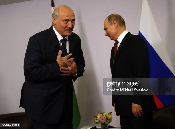 Russian President Vladimir Putin and Belarussian President Alexander Lukashenko are seen during the Eurasian Economic Union Summit May 14, 2018 in...