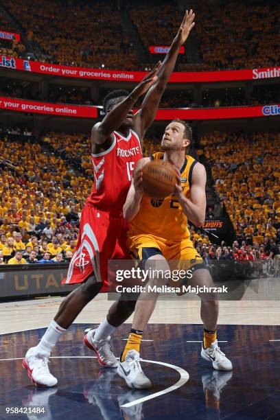 Joe Ingles of the Utah Jazz handles the ball against Clint Capela of the Houston Rockets during Game Four of the Western Conference Semifinals of the...