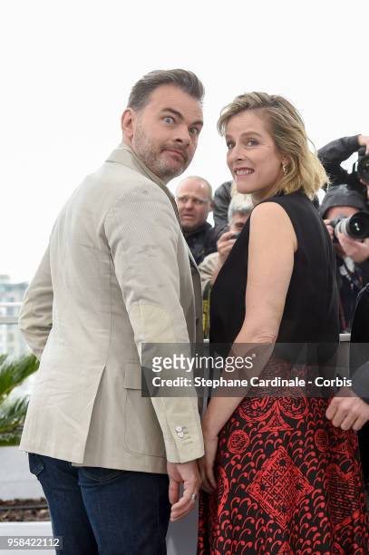 Clovis Cornillac and Karine Viard attend the "Little Tickles " Photocall during the 71st annual Cannes Film Festival at Palais des Festivals on May...