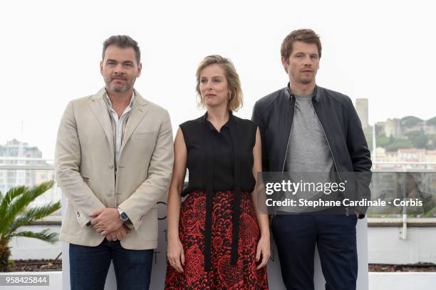 Clovis Cornillac, Karin Viard and Pierre Deladonchamps attend the "Little Tickles " Photocall during the 71st annual Cannes Film Festival at Palais...