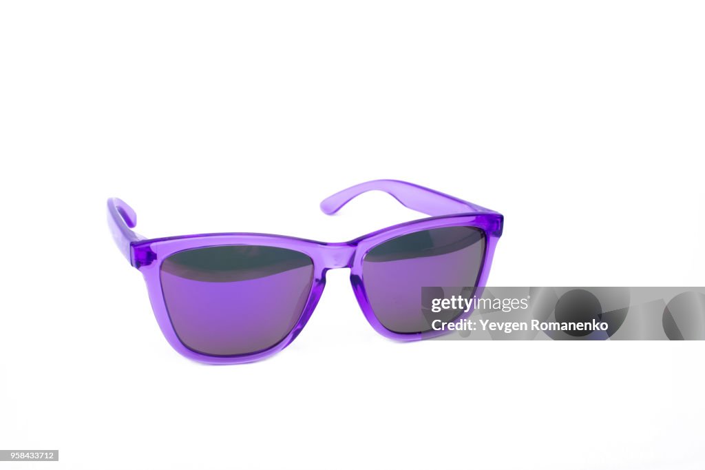 Purple sunglasses isolated on white background